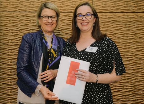 Rose Lougheed (right) receives her graduation certificate from former NSW Health Secretary, Elizabeth Koff.   